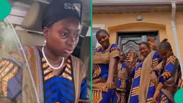 Lady spotted dancing with her younger siblings while their dad's coffin is in compound, gives reason