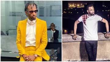 Reactions as 9ice is caught on video caressing a lady barely a year after his wedding