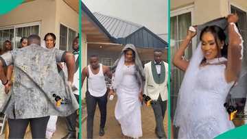 Caring wedding MC takes off his suit, hands it to bride to cover herself from rain, video trends