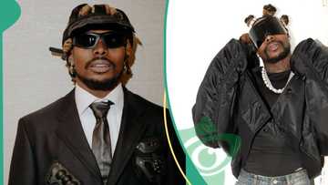 Kanye West inspiration: Fans knock Asake following maxi jean skirt outfit for performance