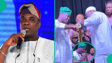 Video of KWAM 1 refilling his famous water flask before performing at an event triggers reactions