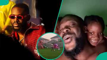 Adekunle Gold plays football with daughter, she uses hand to score goal in video: “Project Oshoala”