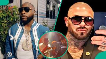 Moment Davido’s bodyguard inspects singer’s drink sparks reactions: “He no trust people around 001”