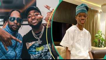 Wizkid's first son Bolu and Popcaan spotted together in London: "E dey represent popsy everywhere"