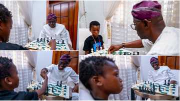 Gov Sanwo-Olu battles 10-year-old chess champion in friendly game, shares cute photos as it ends in stalemate