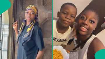 "Your boyfriend made you a stepmum": Lady happily declares, flaunts her man's son in video