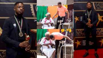 Policeman who repaired damaged traffic light donates walker to 70-year-old amputee
