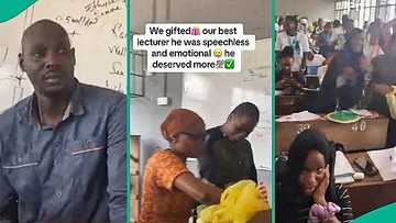 Nigerian lecturer struggles to hold back tears as students suddenly bring gifts before him in video