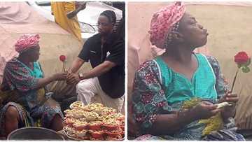 "She remembered her youth": Old woman selling groundnut gets rose flower, blows kiss to man who gave it to her