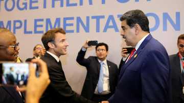 Macron accused of 'U-turn' over Maduro encounter