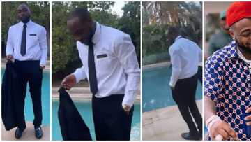 Who sew this trousers? Mixed reactions as Davido rocks black suit to wedding in Morocco, video goes viral