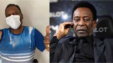 Football legend Pele gives the thumbs up as he gets his COVID-19 vaccine