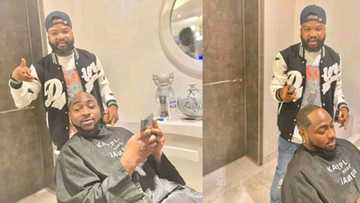 To barb OBO na great achievement: Benue hairstylist celebrates after giving Davido a hair cut in Lagos