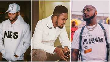 Kizz Daniel stands with his manager after Davido reportedly slapped him at his concert