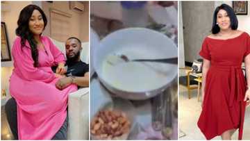 "Na too much money cause this rubbish": Reactions as Wiliams Uchemba's wife drinks garri for the 1st time