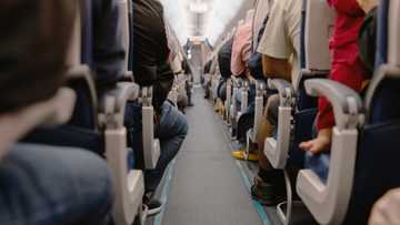 The woman behind me let her daughter kick my seat — Then the flight attendant spoke