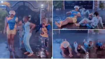 Mercy Johnson brings out her inner child as she dances, swims on the floor with her kids under heavy rain