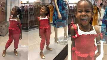 "Whose child is this?" Little girl acts like a mannequin at mall, video keeps people in stitches