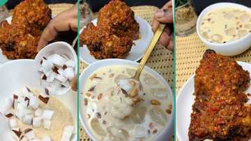 "Count me out of flat tummy": Lady enjoys soaked garri with full chicken, milk and coconut