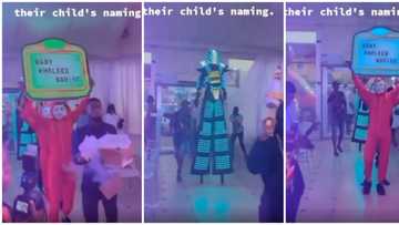 Nigerian parents turn their child's naming ceremony to club as they do 'Dorime' with fog & masquerade in video