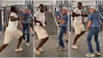 He was ready: Dancer in grey shorts shakes waist in front of escalator, Oyinbo man joins him, video goes viral