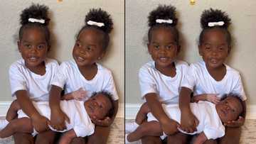 "I'm blessed to be their mother": Excited mum posts video of her twin babies holding her new child