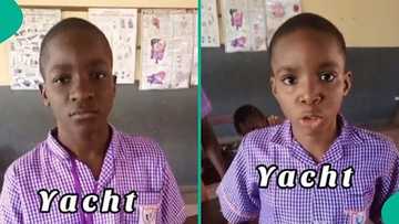 Video as teacher asks 2 students to pronounce 'yacht' in class, video captures their responses