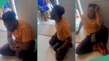 Nigerian man sits on bare floor to celebrate as wife gives birth after 16 hours of labour