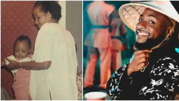 Davido shares adorable throwback photo of his late mother carrying him as a baby