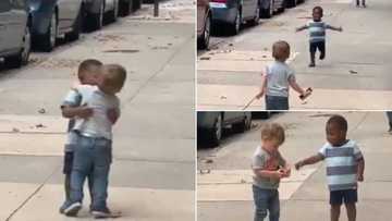 Video of two toddlers hugging on the street melts hearts online