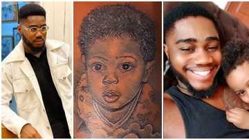 BBNaija star Praise shows off stunning new tattoo of son's face on his arm in new video