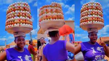"She can fix Nigeria": Lady who sells eggs arranges them in tray like 8-storey building, video goes viral