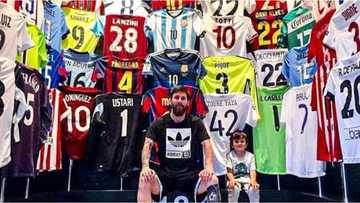 Cristiano Ronaldo’s shirt missing as rival Lionel Messi poses with scores of player jerseys he swapped with