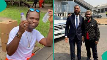 Speed Darlington smiles as Deji Adeyanju drops him off at airport hours after his release