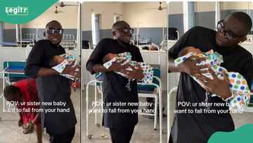 “Just like my husband”: Video of man struggling to carry newborn baby sparks funny reactions online