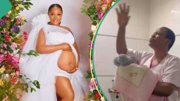 Uche Ogbodo prays for newborn baby in hospital, stirs reactions: "Who prays and makes a video?"