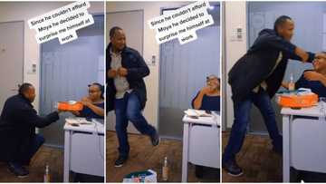Lovely video shows moment man surprisingly showed up at his wife's office, danced and gave her pizza