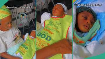 Nigerian grandmother who attends Lord's Chosen wears her grandson church's apron