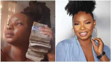 Coronavirus: Yemi Alade flaunts wads of money as she advises fans