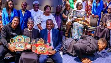 Anthony Joshua meets President Buhari in UK, presents his heavyweight belts to him (photos, video)