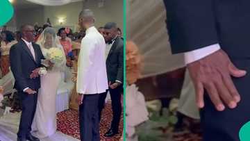 Nigerian father's funny gesture to son-in-law on wedding day goes viral, people react