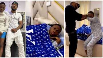 Hilarious video of Charles Okocha waking his son up leaves people cracking up: "Abeg let the boy sleep"