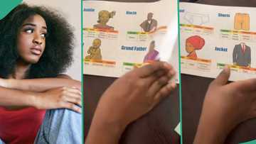 Nigerian student in tears as she displays N4k textbook her department forced them to buy