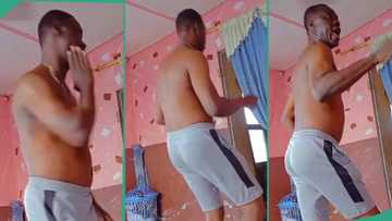 Man dances inside room like Michael Jackson, moves waist same way like late pop star