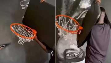 Internet users react as African artist does amazing Kobe Bryant painting with basketball hoop