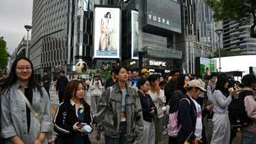 China eases monetary policy to boost ailing economy