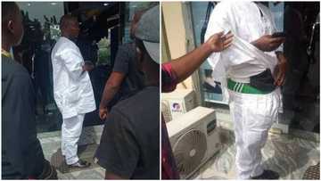 Nigerian big man caught shoplifting clothes from a boutique in Abuja