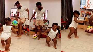 "How old is he?" Plumpy baby boy plays football inside room with his father, video goes viral