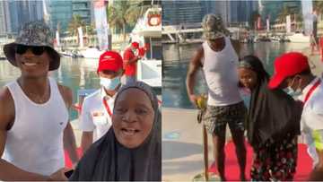 Hilarious moment Ighalo joked about letting go of mother after she photobombed him in his Lekki mansion