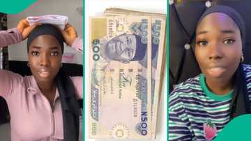 Lady in tears as someone allegedly transfers stolen money into her bank account